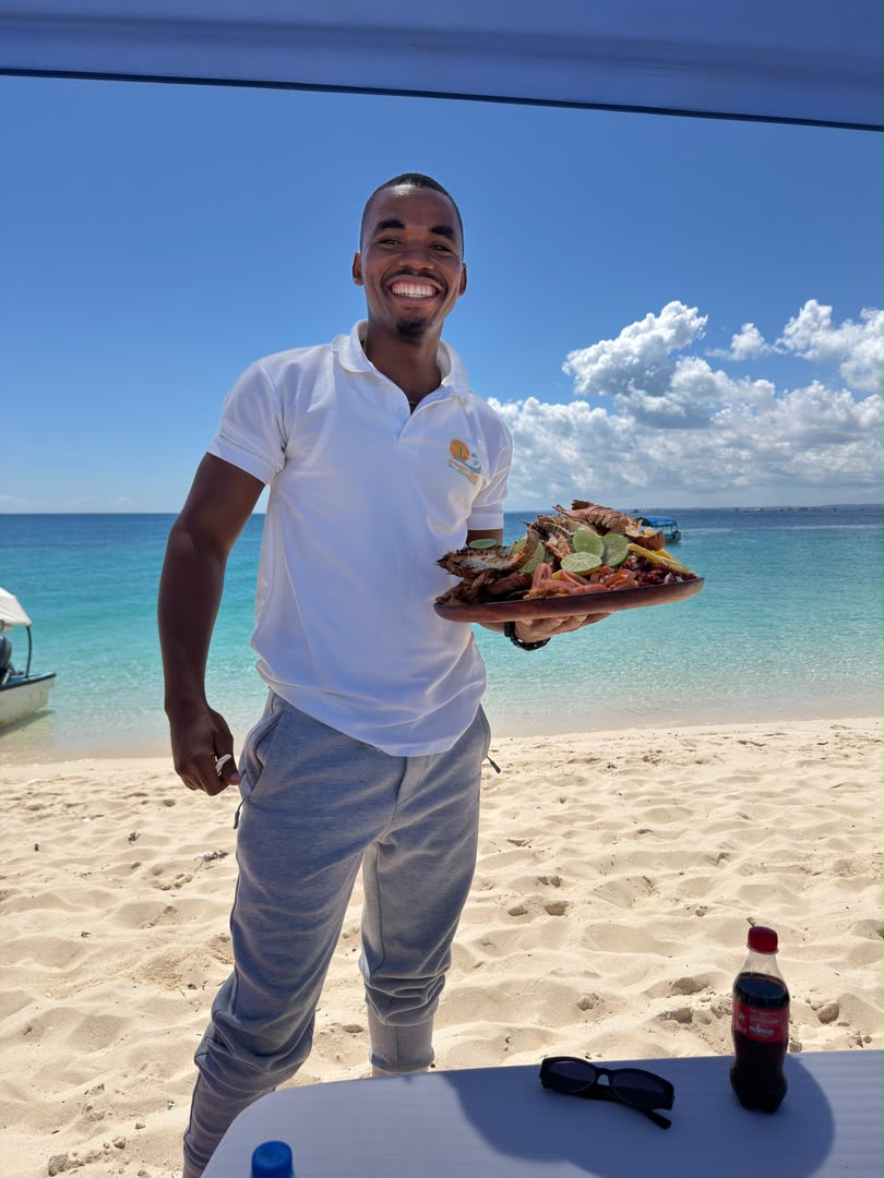 Grilled seafood platter served on the beach