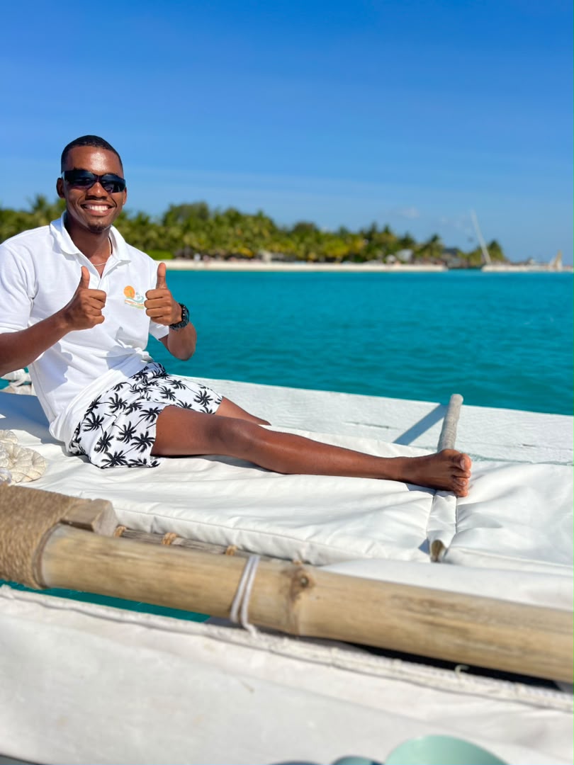 Dynasty guide on a boat in Zanzibar
